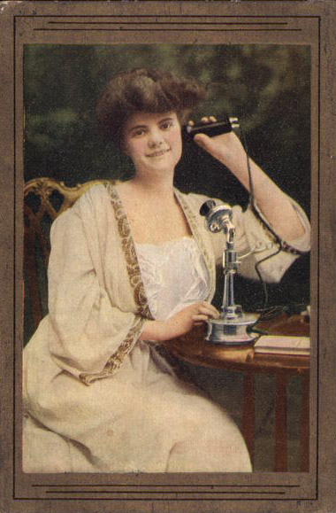 Woman Holding Old-Style Telephone